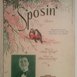 May include: A vintage sheet music cover with a floral design and two birds. The title of the song is "Sposin'" and it is a ballad. The words are by Andy Razap and the music is by Paul Denniker. The cover also features a photo of Leo Zollo.