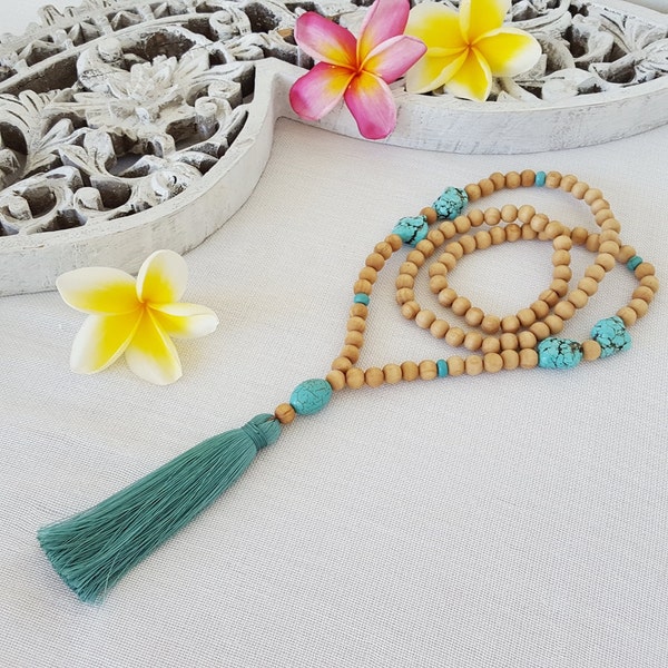 Wooden bead tassel necklace with turquoise feature beads and a sage tassel