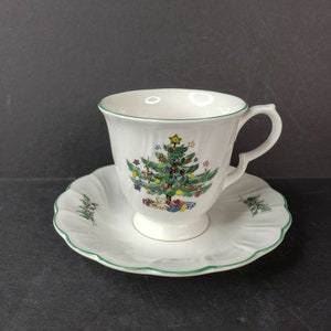 Nikko Happy Holidays Tea Cup and Saucer Christmas Tree Motif Blue Back Stamp