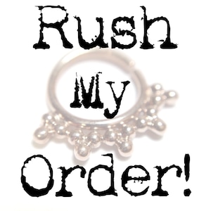 May include: A silver nose ring with a decorative design of small beads around the ring. The text "Rush My Order!" is written in black letters above the ring.