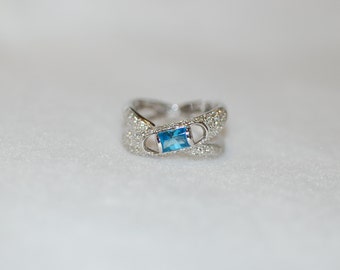 Blue Topaz and Diamond Pave Cylinder Bypass Ring