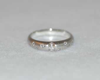 Floating Diamond 18K White Gold Ring