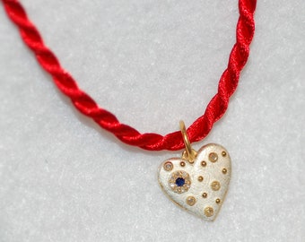 Sapphire and Diamond Heart Starburst Pendant