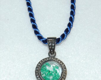 Floating Emerald Pendant