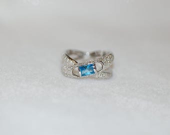 Modern Designer Blue Topaz Cylinder and Diamond Pave 18K White Gold Bypass Ring
