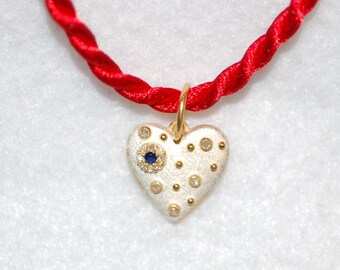 Sapphire and Diamond Heart Starburst Pendant