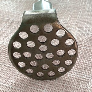 Vintage iron potato masher
