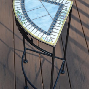 May include: A set of three ceramic mugs with a speckled, matte finish. The mugs are in shades of cream, light gray, and dark gray. Each mug has a simple, minimalist design, perfect for coffee or tea.