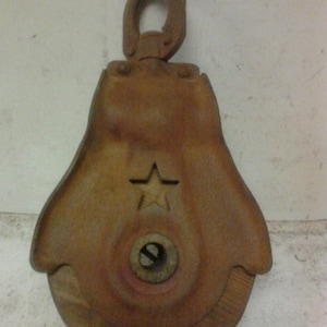 Wood and metal pulley