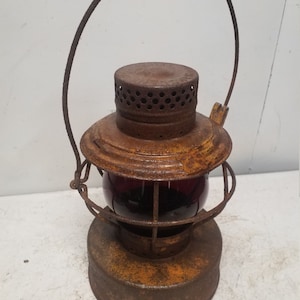 Handling railroad or highway lamp