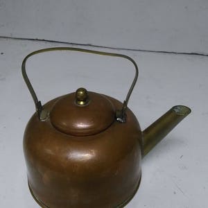 Brass and copper tea pot