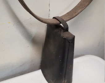 Antique  cow bell and leather  strap