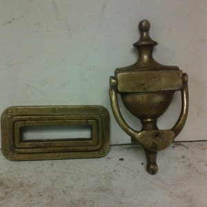 Brass door knocker and mail slot