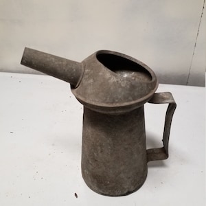 Metal  oil can