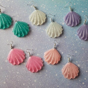Sea shell glitter resin earrings. Handmade unusual quirky cute earrings