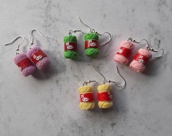 Cute balls of wool earrings. Unusual, quirky and fun. Available in different colours. Great gift for knitting fanatics