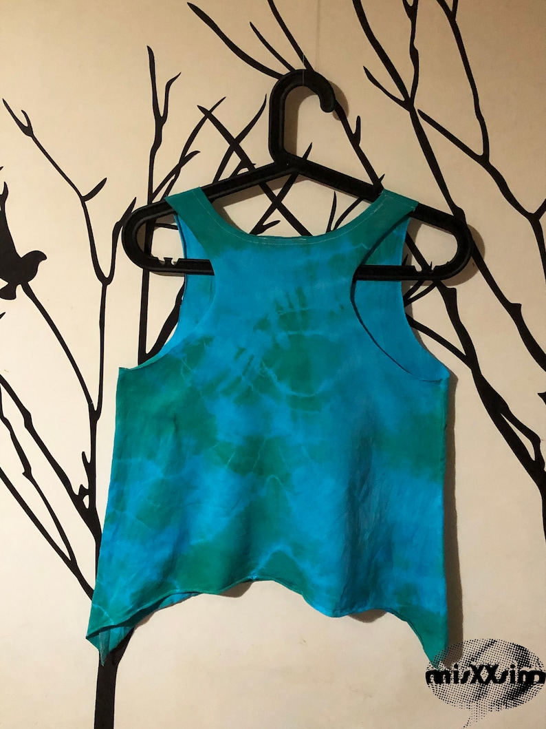 May include: A blue and green tie-dye tank top with a slightly asymmetrical hem.