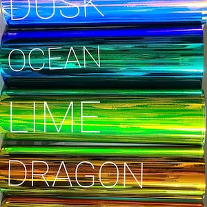 May include: A stack of eight iridescent vinyl sheets with different color names printed on each sheet. The colors are: Pearl, Indigo, Dusk, Ocean, Lime, Dragon, Lotus, Sunset, and Coral.