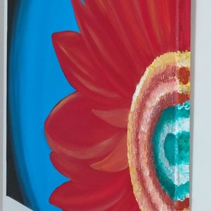May include: A red flower with a yellow center and a teal blue and white swirl in the center. The flower is painted on a blue background.