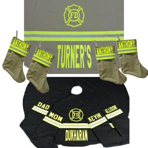 May include: A set of personalized firefighter-themed Christmas stockings and tree skirts. The gray items feature the text TURNER'S and ANTHONY, while the black items feature DAD, MOM, KEVIN, ALLISON, and DUKHARAN, all with yellow FD emblems and reflective stripes.
