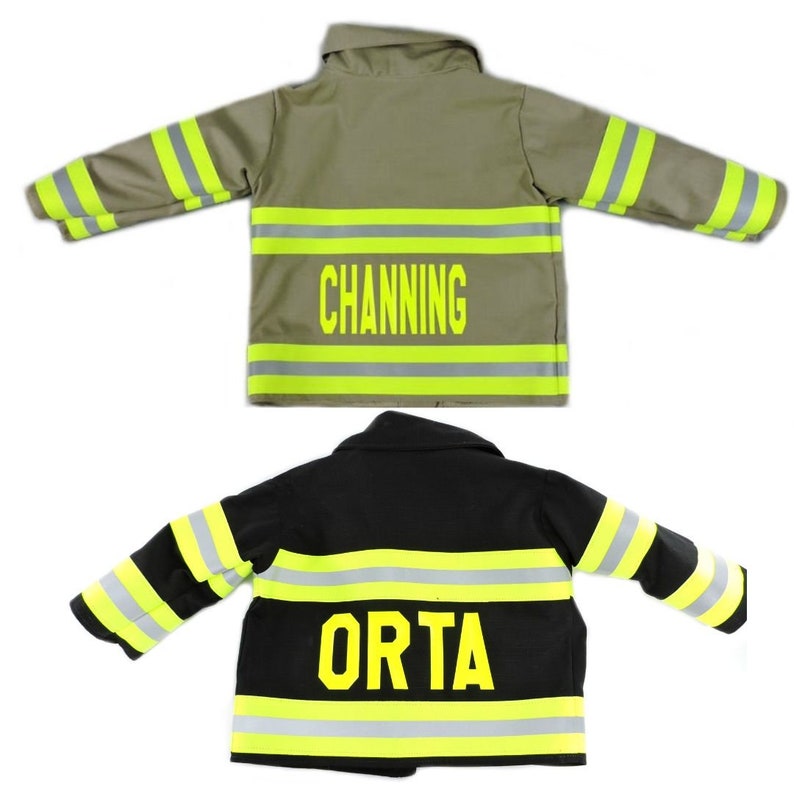 May include: Two miniature firefighter jackets, one khaki and one black. The khaki jacket has the name "CHANNING" in yellow block letters. Both jackets feature reflective yellow and silver stripes for safety.