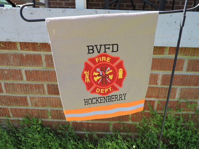 Firefighter Garden flag with Maltese cross and two names added in Tan Fabric and Neon Orange Reflective Tape