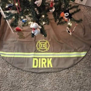 Firefighter Christmas Tree Skirt with a name and maltese cross added
