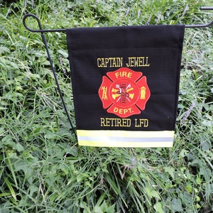 Firefighter Garden flag with Maltese cross and two names added in Black Fabric and Neon Yellow Reflective Tape