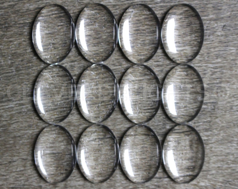 25 Pack 13x18mm Oval Glass Cabochons Clear Transparent Solid Glass Magnifying Cabs 1/2 x 3/4 image 1