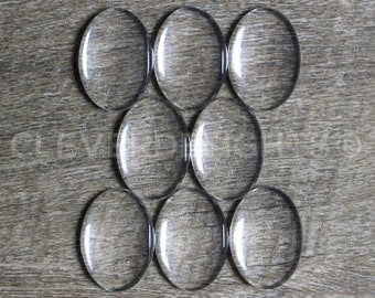 50 Pack - 18x25mm Oval Glass Cabochons - Clear Transparent Solid Glass Magnifying Cabs - 3/4" x 1"