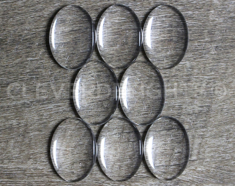 50 Pack 18x25mm Oval Glass Cabochons Clear Transparent Solid Glass Magnifying Cabs 3/4 x 1 image 1