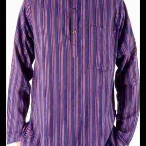May include: A purple and white striped long-sleeved shirt with a mandarin collar and a single button closure. The shirt has a chest pocket.