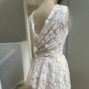 Vintage 1950s off white lace knee length wedding dress