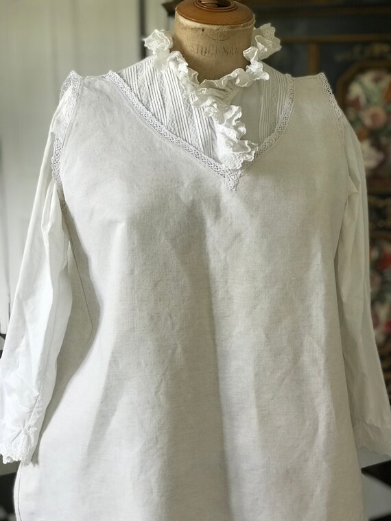 Smock linen dress with crotchet lace detailing nec