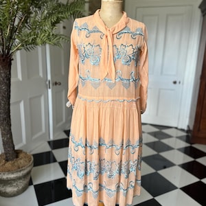 1920s day dress in Peach muslin with silk floss embroidery