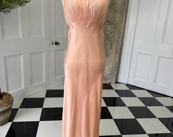 1930s peach slip dress with hand embroidery details