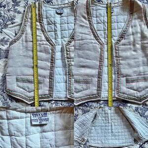 May include: A white quilted vest with green, red, and pink trim. The vest has a label that reads "Rayon or Dry Clean Hand Wash Cold Water M".