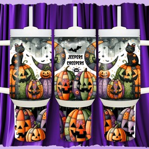 May include: Halloween-themed tumbler with a white lid and handle. The design features a black cat, pumpkins, witch hats, and the text "Jeepers Creepers." The tumbler has a straw and is set against a purple curtain.