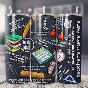 May include: Black and white tumbler with a chalkboard design featuring math-related puns and illustrations. The text includes "Math Book", "Do the Math", "e=mc2", "Plants Hate Math", and "I'm a Math Teacher".