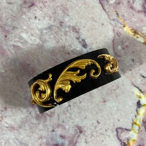 Handmade Resin Cuff Bracelet. Fashion Jewelry. Black and Gold.