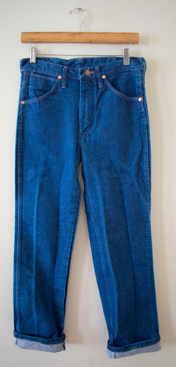 Worn out wrangler jeans sales