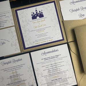 May include: Wedding invitation suite with a gold and purple color scheme. The invitation features a castle silhouette and elegant script. Includes RSVP, reception, and accommodation cards, and gold envelopes.
