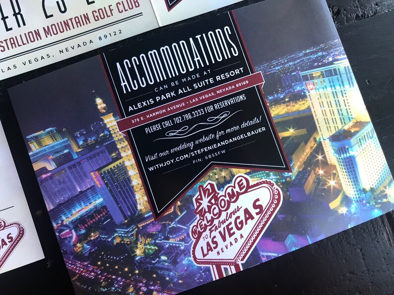 May include: A black and white invitation card with red accents. The card features a nighttime aerial view of Las Vegas, Nevada. The text on the card reads "Accommodations can be made at Alexis Park All Suite Resort 375 E. Harmon Avenue Las Vegas, Nevada 89165 Please call 702.796.3333 for reservations Visit our wedding website for more details! Withjoy.com/Stefenieandangelbauer PIN: 6855FW Welcome to Fabulous Las Vegas Nevada".