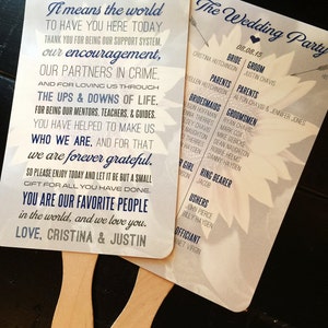 May include: Two wedding fan programs with text in navy blue and light gray. One fan reads "To our family & friends, thank you. It means the world..." The other fan lists the wedding party details, including the date, bride, groom, and attendants.