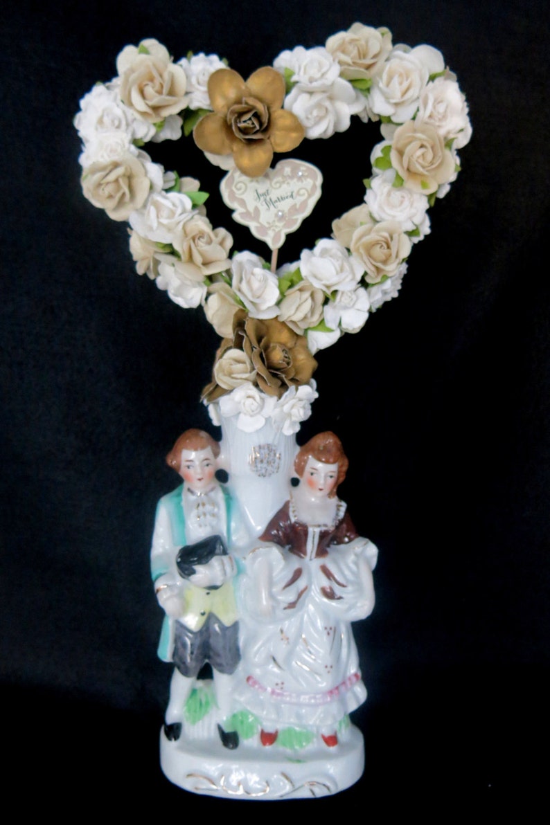 Wedding cake topper. Vintage porcelain bride and groom in French country 1700s style, paper flowers, heart arch and Just Married sign. image 1