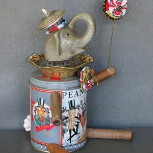 One-of-a-kind assemblage elephant, Peanut. Porcelain head, Planter's Peanuts tin body, bobbin legs, crystal and brass embellishments. image 4