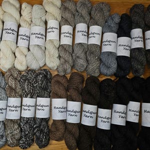 DK 14-15 wpi. Handspun sheepswool yarn. Natural fleece colours. 25g sample skeins.