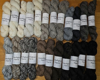 DK 14-15 wpi. Handspun sheepswool yarn. Natural fleece colours. 25g sample skeins.
