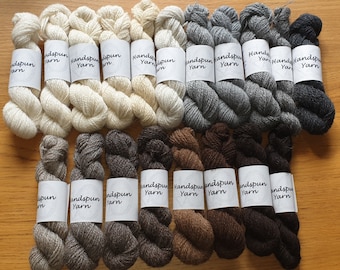 Sports weight 16-17 WPI. Handspun sheepswool yarn. 25g skeins. Natural fleece colours.