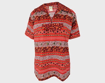 May include: A red short-sleeved shirt with a floral and striped pattern. The shirt has a pointed collar and a button-up front.